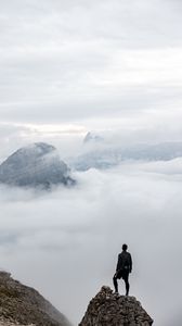 Preview wallpaper man, loneliness, alone, traveler, rocks, fog