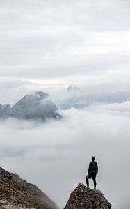 Preview wallpaper man, loneliness, alone, traveler, rocks, fog