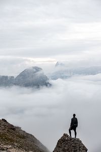 Preview wallpaper man, loneliness, alone, traveler, rocks, fog