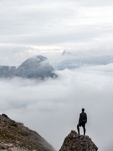 Preview wallpaper man, loneliness, alone, traveler, rocks, fog