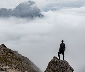 Preview wallpaper man, loneliness, alone, traveler, rocks, fog
