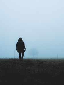 Preview wallpaper man, loneliness, fog, grass