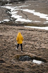 Preview wallpaper man, loneliness, jacket, yellow, walk