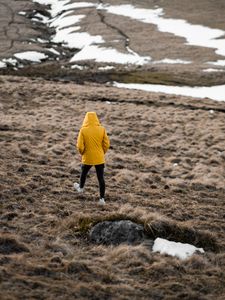 Preview wallpaper man, loneliness, jacket, yellow, walk