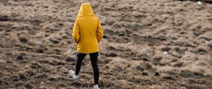 Preview wallpaper man, loneliness, jacket, yellow, walk