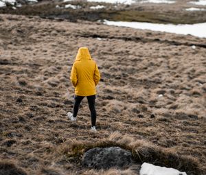 Preview wallpaper man, loneliness, jacket, yellow, walk