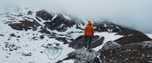 Preview wallpaper man, loneliness, solitude, snow, stones, fog