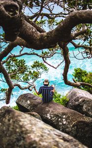Preview wallpaper man, loneliness, stones, sea, solitude