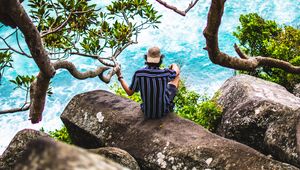 Preview wallpaper man, loneliness, stones, sea, solitude