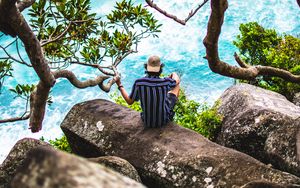 Preview wallpaper man, loneliness, stones, sea, solitude