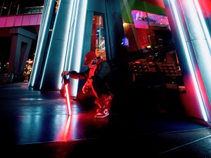 Preview wallpaper man, mask, alone, neon, street, building, architecture