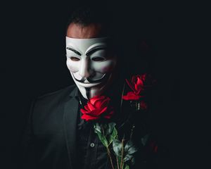 Preview wallpaper man, mask, anonymous, roses, flowers, bouquet