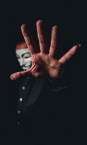 Preview wallpaper man, mask, anonymous, hand, gesture