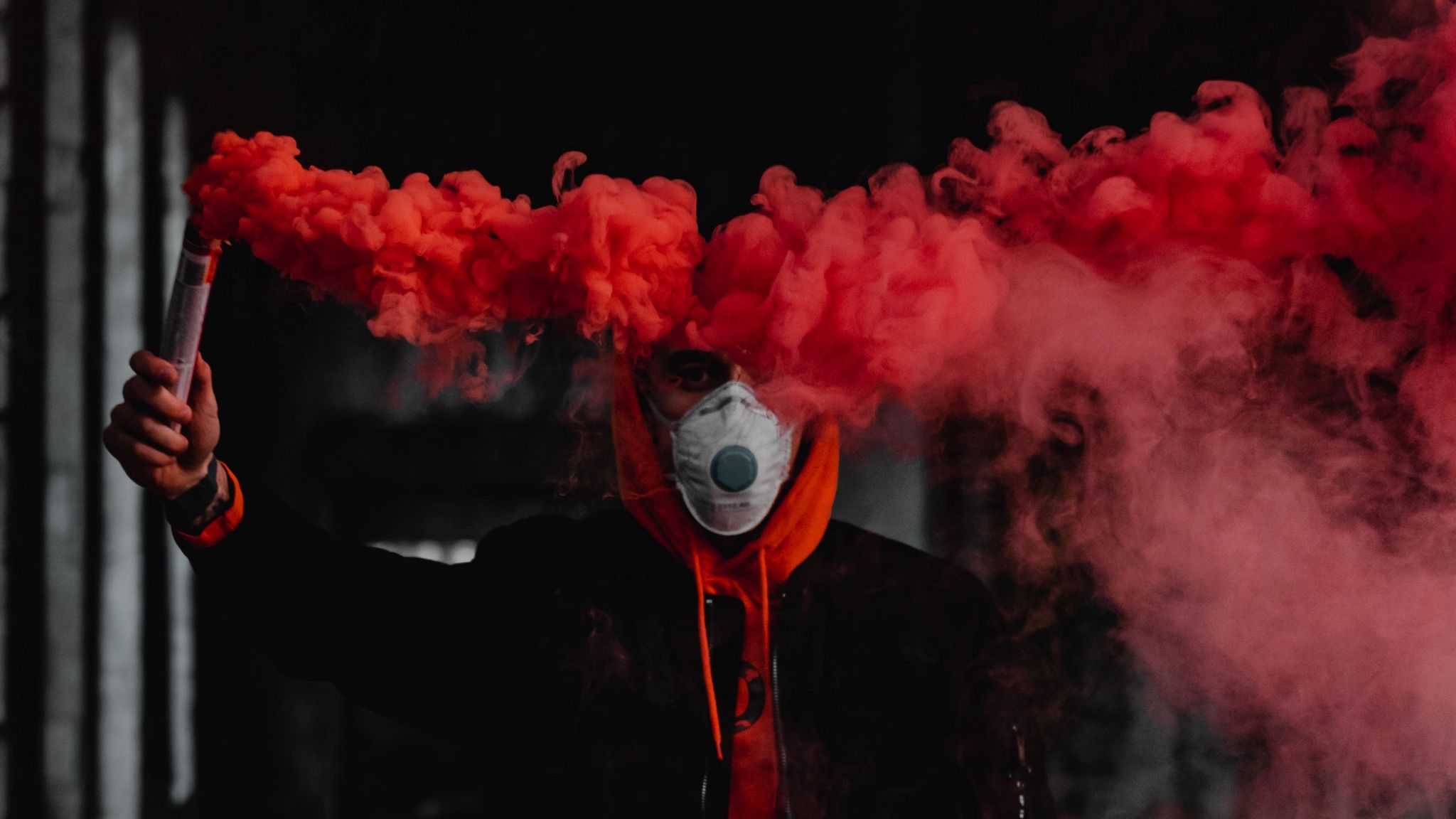 2048x1152 Wallpaper man, mask, colored smoke