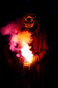 Preview wallpaper man, mask, fire, smoke, dark
