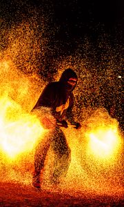 Preview wallpaper man, mask, fire, sparks, fire show, dark