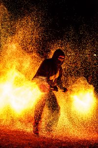 Preview wallpaper man, mask, fire, sparks, fire show, dark