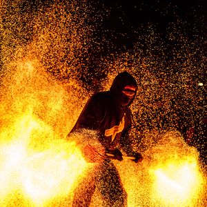 Preview wallpaper man, mask, fire, sparks, fire show, dark