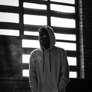 Preview wallpaper man, mask, hood, hoodie, bw