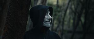 Preview wallpaper man, mask, hood, anonymous, forest