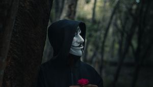 Preview wallpaper man, mask, hood, anonymous, forest