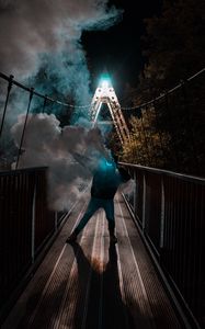 Preview wallpaper man, mask, neon, smoke, bridge