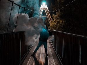 Preview wallpaper man, mask, neon, smoke, bridge
