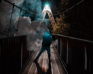 Preview wallpaper man, mask, neon, smoke, bridge