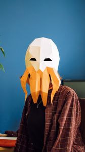 Preview wallpaper man, mask, polygon, octopus, room