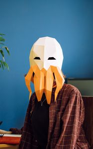 Preview wallpaper man, mask, polygon, octopus, room