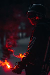 Preview wallpaper man, mask, pyrotechnics, fire, dark