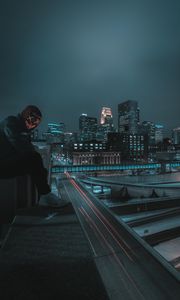 Preview wallpaper man, mask, roof, city, night