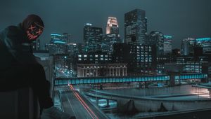 Preview wallpaper man, mask, roof, city, night