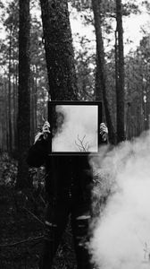 Preview wallpaper man, mirror, smoke, bw, forest