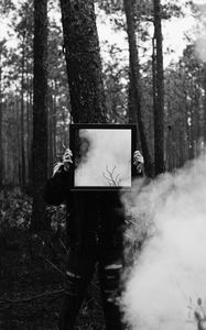 Preview wallpaper man, mirror, smoke, bw, forest