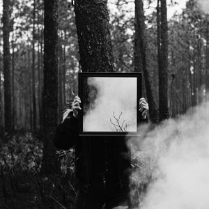 Preview wallpaper man, mirror, smoke, bw, forest