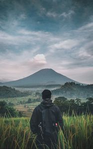 Preview wallpaper man, mountain, volcano, nature, landscape