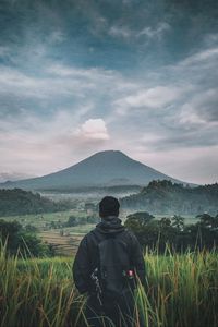 Preview wallpaper man, mountain, volcano, nature, landscape