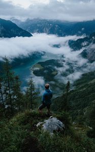 Preview wallpaper man, mountains, clouds, travel