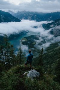 Preview wallpaper man, mountains, clouds, travel