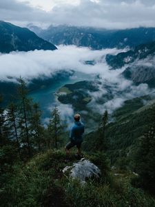 Preview wallpaper man, mountains, clouds, travel