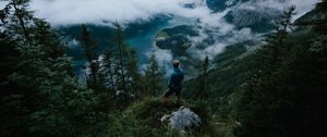 Preview wallpaper man, mountains, clouds, travel