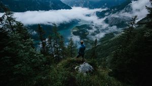 Preview wallpaper man, mountains, clouds, travel