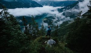 Preview wallpaper man, mountains, clouds, travel