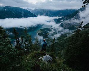 Preview wallpaper man, mountains, clouds, travel