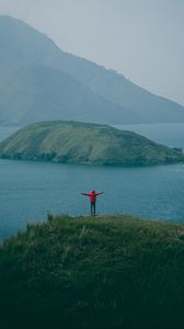 Preview wallpaper man, mountains, island, sea, fog