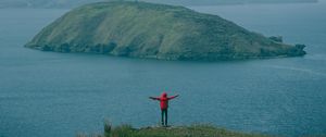 Preview wallpaper man, mountains, island, sea, fog