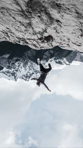 Preview wallpaper man, mountains, jump, fall, illusion