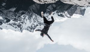 Preview wallpaper man, mountains, jump, fall, illusion