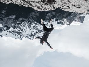 Preview wallpaper man, mountains, jump, fall, illusion